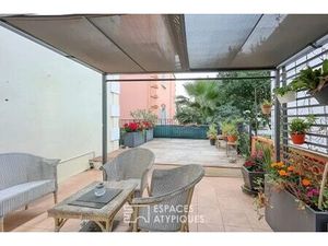 Duplex historique avec terrasses en centre ville