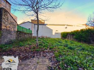 À Vendre : Maison de Bourg avec Terrain et Dépendances à Lang