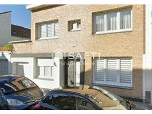 Appartement de 2 chambres dans un quartier recherché  cave et garage  proche de la plage