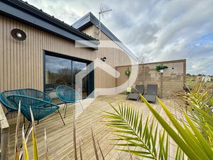 Maison récente avec jardin