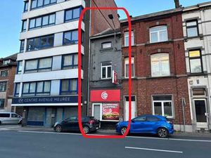 Immeuble mixte avec surface commerciale et duplex 2 chambres