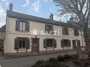 Maison de village : le charme d'un ancien hôtel aux volumes généreux