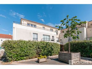LOUVRES - Appartement deux pièces avec balcon et parking en sous-sol