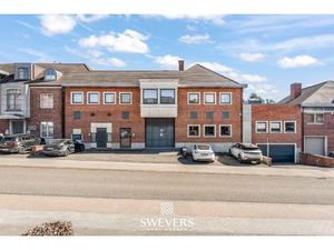 Handelspand met ruime woning in hartje Lummen – een unieke opportuniteit