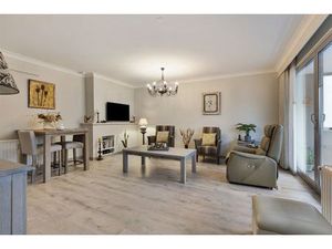 Ruim gelijkvloers 2-slaapkamer appartement met overdekt terras  ondergrondse autostaanplaa