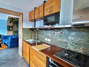 Appartement T2 transformable en T3 avec terrasse  cave et garage