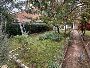 Maison 2 chambres + dépendance + garage + puit