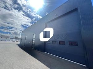 A LOUER  BATIMENT NEUF + TERRAIN DE 500 M²
