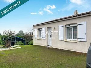 Maison de plain-pied au cœur du village – Calme  jardin et potentiel