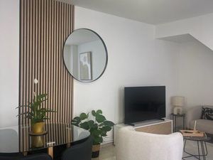 Appartement meublé 55 m² – 2 chambres + parking – Proche marché couvert