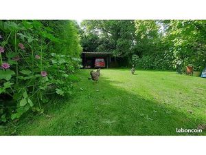 1 maison + 1 maison en grand atelier + jardin clos