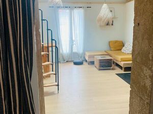 Appartement + Local professionnel + Jardinet