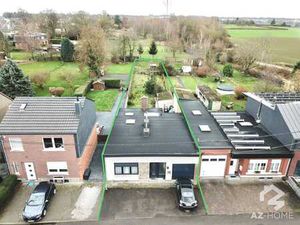 BUNGALOW ENTIÈREMENT RÉNOVÉ AVEC GRAND JARDIN ET GARAGE