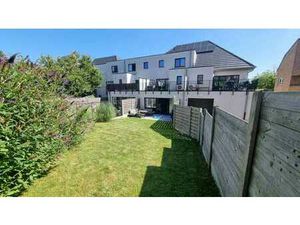 Appartement QNE moderne avec jardin  3 ch. et parking.