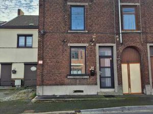 UNE MAISON D’HABITATION AVEC JARDIN