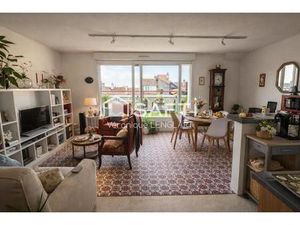 Appartement de 2 chambres dans un quartier recherché  cave et garage  proche de la plage