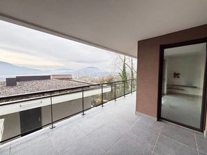 Bien d'exception - T2 en dernier étage avec terrasse panoramique -Vue lac & montagnes