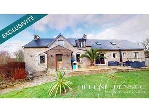 Bâtisse de 170 m²  avec vie de plain-pied  atelier  double-garage et environ 1 500 m² de t