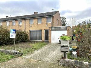 Halfopen woning met zonnige tuin