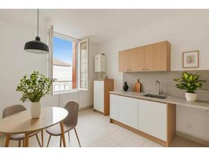 Appartement 5 pièces de 126 m² sur 3 niveaux avec balcon  jardin