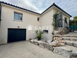 Villa récente avec garage proche écoles.