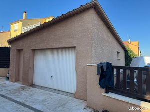 Loue grand garage avec portail automatique