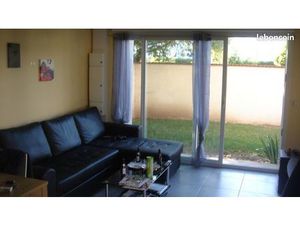 Appartement t 3 avec cour et jardin