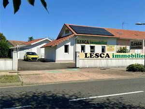 Maison à usage commercial et d'habitation