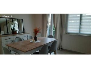 Appartement avec garage  terrasse et jardinet privés