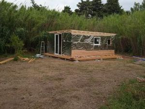 Châlet en bois habitable en énergie entièrement autosuffisance a vendre