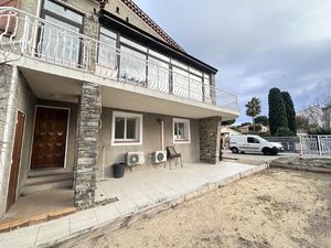 Grand bas de villa au calme avec jardin  parking et abri