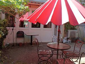 Très bel appartement avec charmant jardin arboré + très grande cave  tous deux privatifs