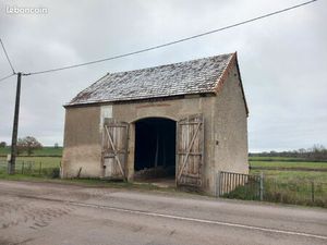 Vend bâtiment avec terrain