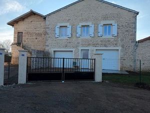 Maison avec garage et jardin