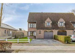 Aangename halfopen woning met tuin en inpandige garage