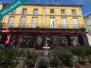 Immeuble de rapport : 6 appartements + local loué