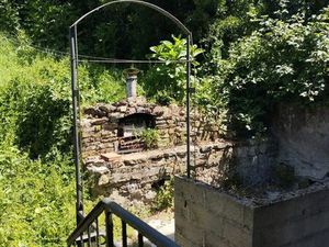 A louer appartement centre CRANSAC avec jardin au calme
