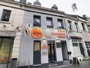 COMMERCE RENOVE AVEC 2 APPARTEMENTS EN GROS OEUVRES