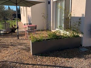 T2 35 m2 avec petit jardin et 1 place de PK privative