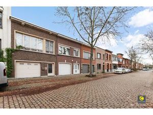 Woning met gezellige tuin en garage op centrale ligging!