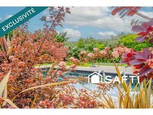 Maison 4 chambres  grand garage  piscine