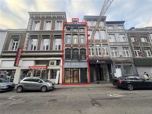 IMMEUBLE DE RAPPORT - 2 LOG. + 1 COMMERCE