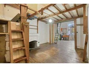 Rez-de-chaussée commercial avec atelier à l’arrière