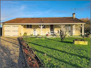 Maison 3 chambres avec joli terrain et garage spacieux