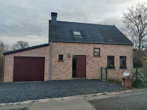 Maison avec garage et jardin