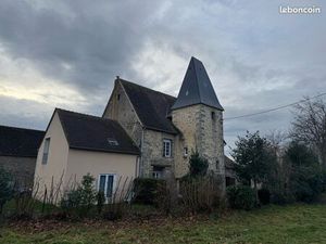 Maison avec tour carré