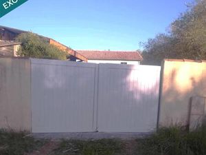 Terrain agricole avec dépôt bâti –