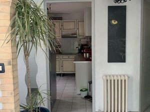 Maison 4 faces grand garage avec jardin