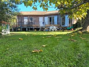 Maison écologique bois sur terrain arboré