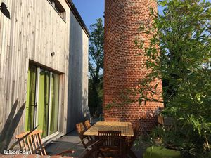 Maison bois bioclimatique avec jardin  terrasse et parkings — plein sud
